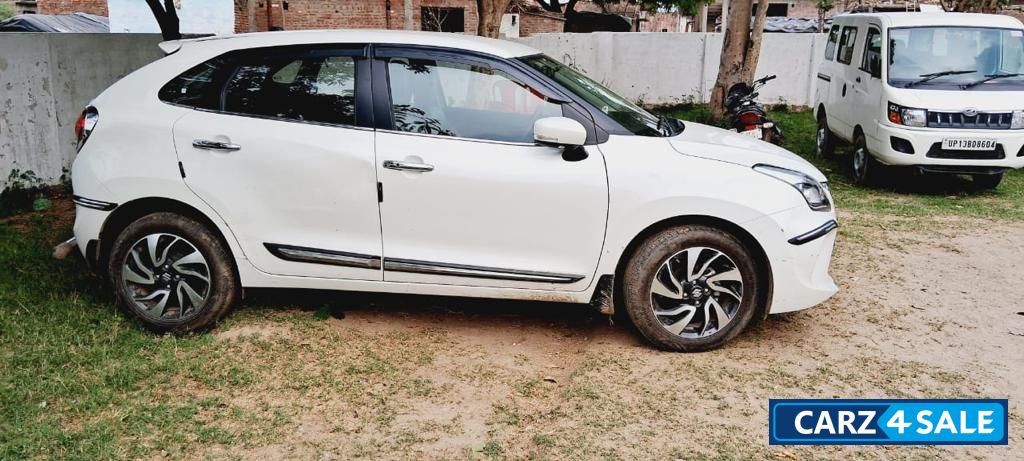 Pearl White Maruti Suzuki Baleno Zeta