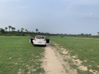 Pearl White Maruti Suzuki Baleno Zeta