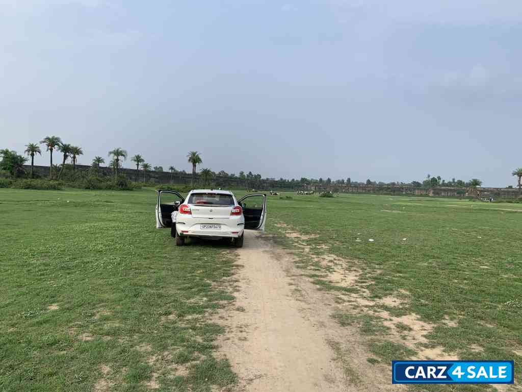 Pearl White Maruti Suzuki Baleno Zeta