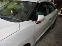 Pearl White Maruti Suzuki Baleno Zeta