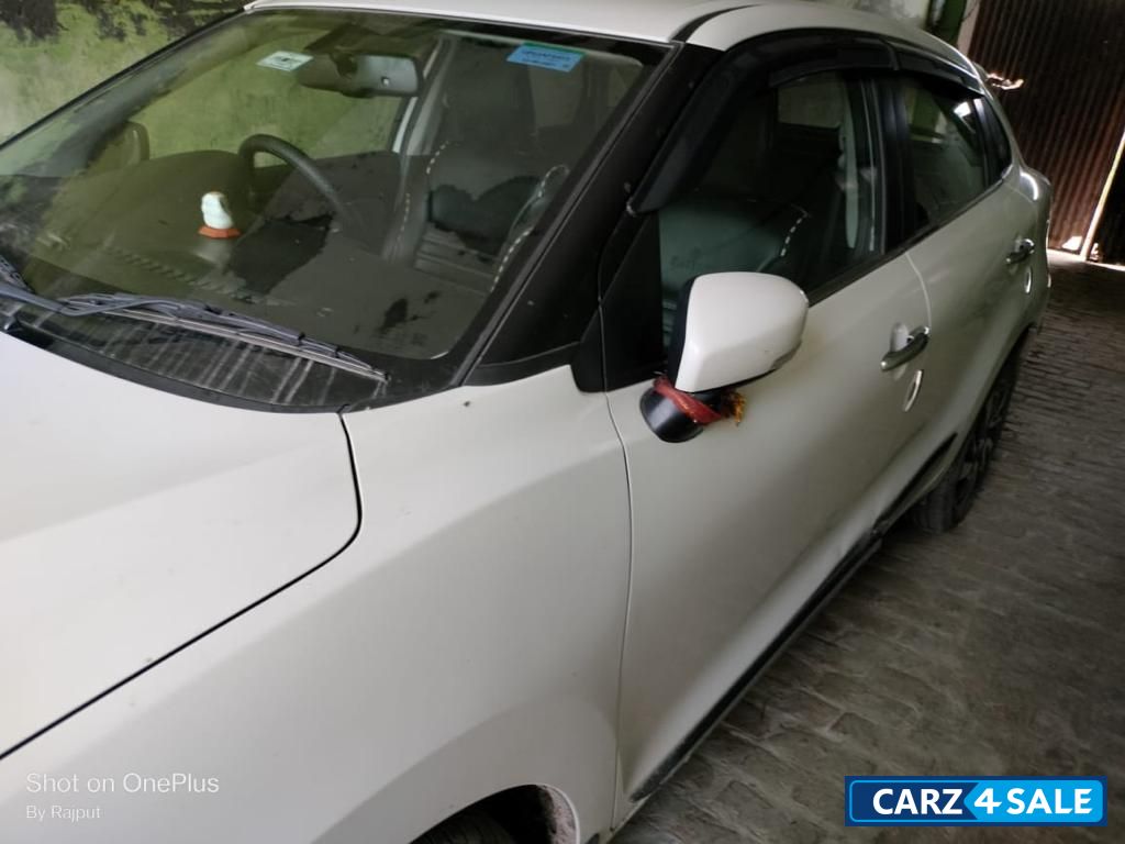 Pearl White Maruti Suzuki Baleno Zeta