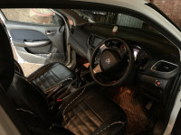 Pearl White Maruti Suzuki Baleno Zeta