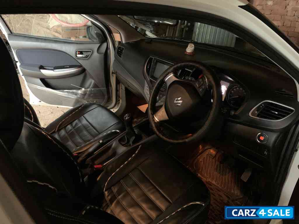 Pearl White Maruti Suzuki Baleno Zeta