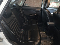 Pearl White Maruti Suzuki Baleno Zeta