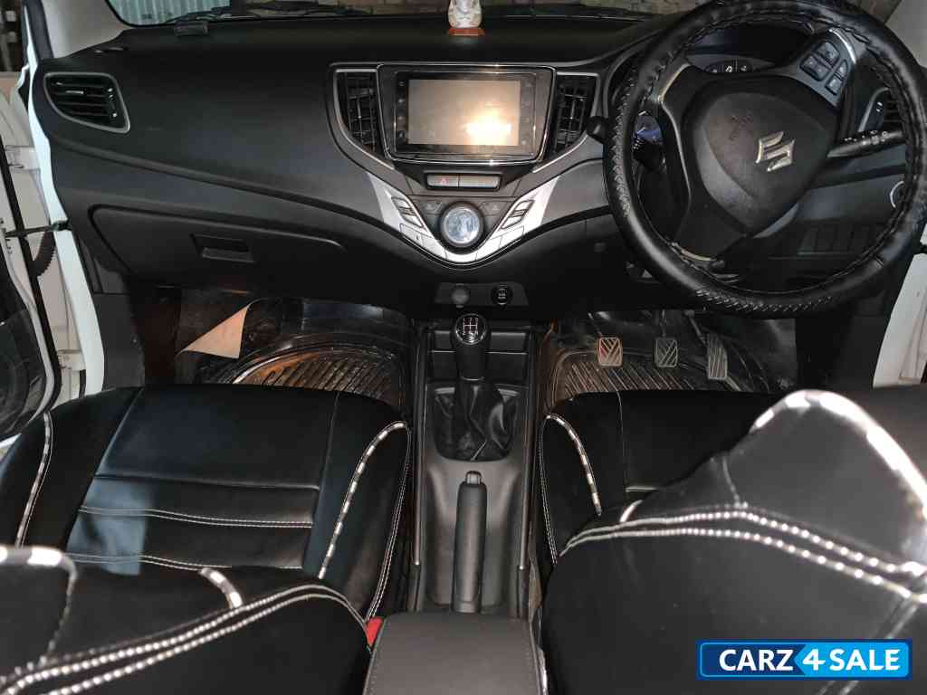 Pearl White Maruti Suzuki Baleno Zeta