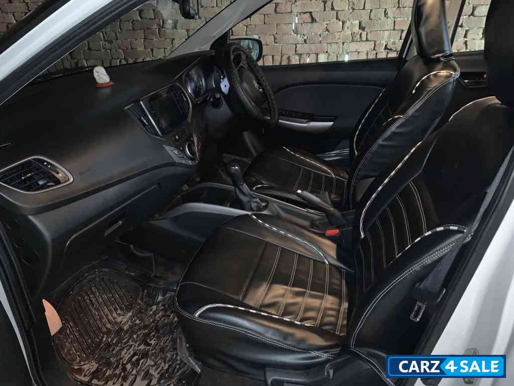 Pearl White Maruti Suzuki Baleno Zeta