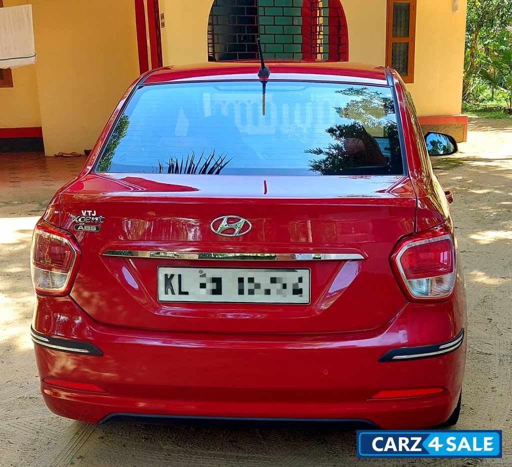 Passion Red Hyundai Xcent VTVT S(O) Petrol
