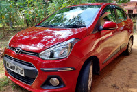 Passion Red Hyundai Xcent VTVT S(O) Petrol