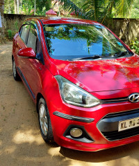 Passion Red Hyundai Xcent VTVT S(O) Petrol
