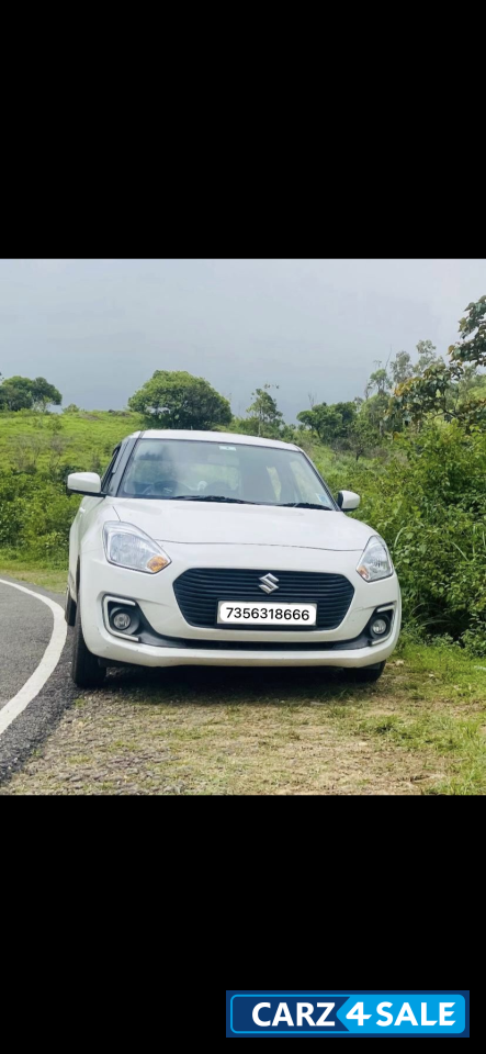 White Maruti Suzuki Swift VXI