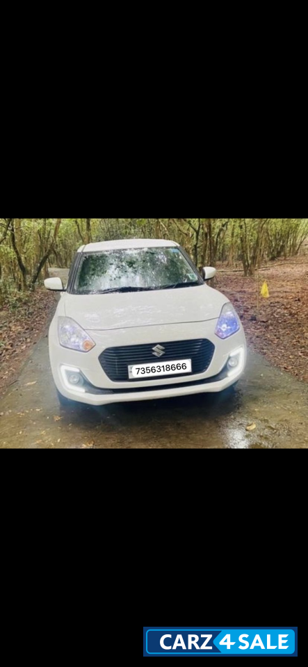 White Maruti Suzuki Swift VXI