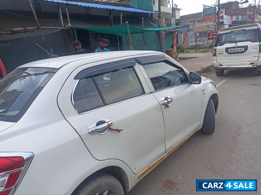 White Maruti Suzuki Dzire Tour s