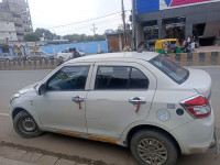 White Maruti Suzuki Dzire Tour s