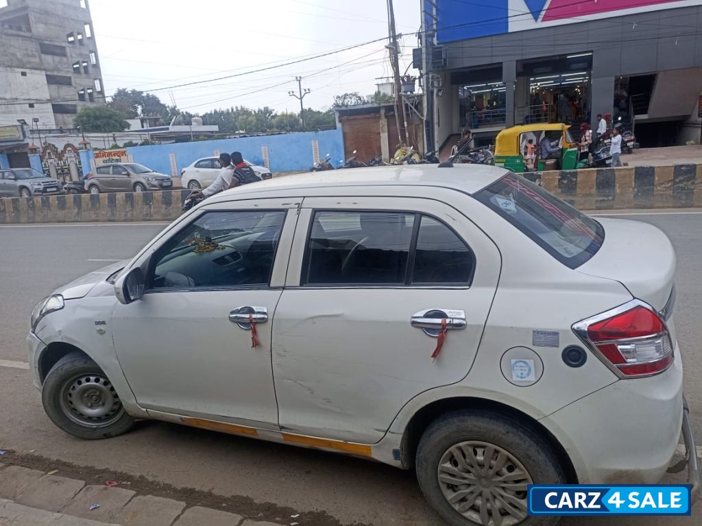 White Maruti Suzuki Dzire Tour s