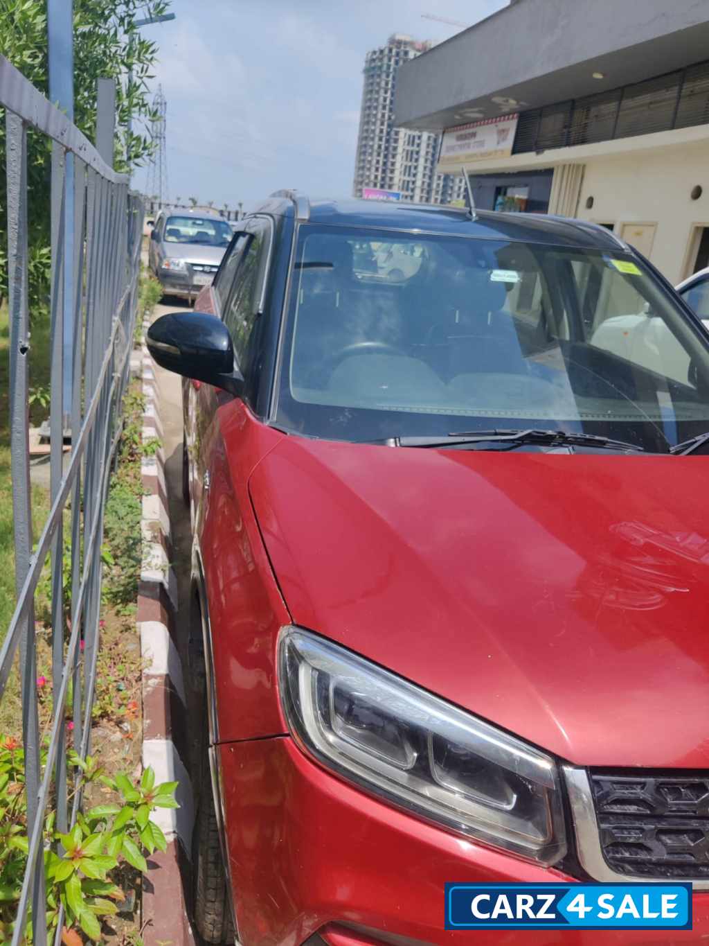 Red Maruti Suzuki Vitara Brezza Zdi plus dual tone