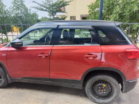 Red Maruti Suzuki Vitara Brezza Zdi plus dual tone