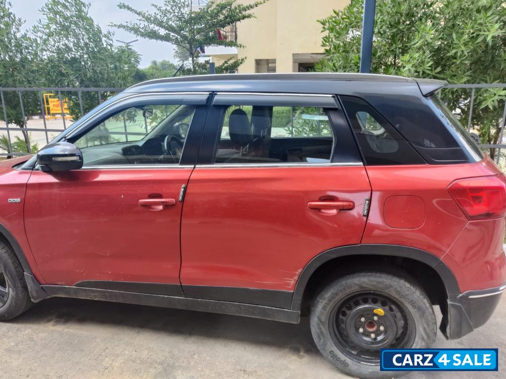 Red Maruti Suzuki Vitara Brezza Zdi plus dual tone