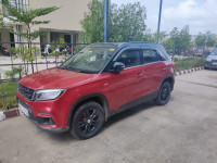 Red Maruti Suzuki Vitara Brezza Zdi plus dual tone