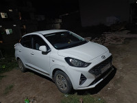 Polar White Hyundai Aura S Petrol+Cng (Company fitted)