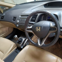 Tafetta White Honda Civic 1.8V Manual with Automatic Sunroof