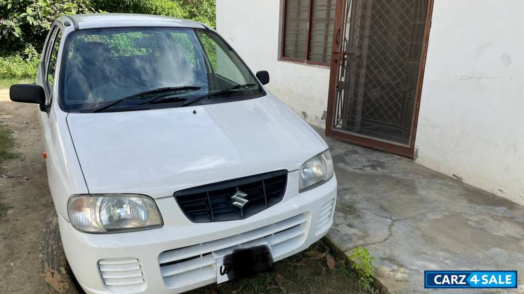 White Maruti Suzuki Alto lxi