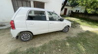 White Maruti Suzuki Alto lxi