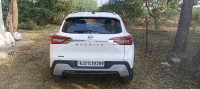 White Nissan Magnite Xv turbo