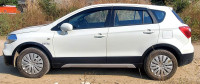 Pearl White Maruti Suzuki S-Cross Sigma
