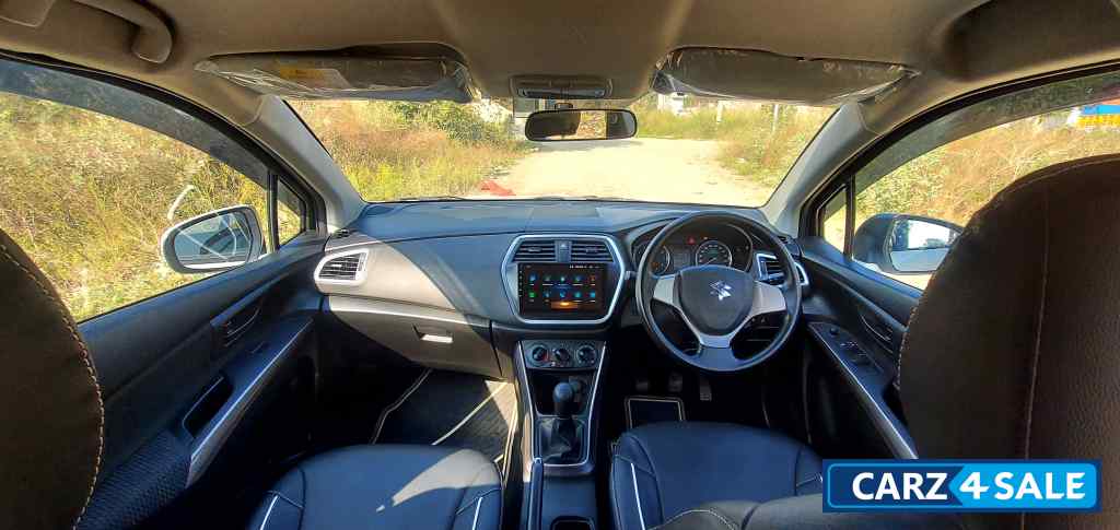 Pearl White Maruti Suzuki S-Cross Sigma