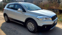 Pearl White Maruti Suzuki S-Cross Sigma