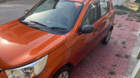 Prime Tango Orange Maruti Suzuki Alto K10 VXI AMT