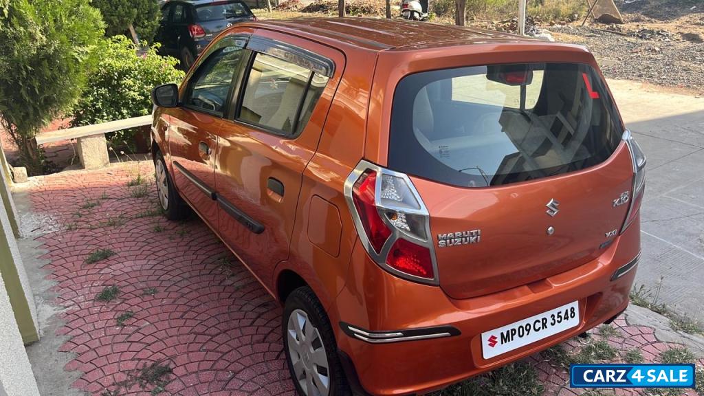 Prime Tango Orange Maruti Suzuki Alto K10 VXI AMT
