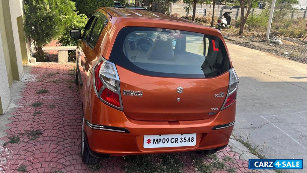 Prime Tango Orange Maruti Suzuki Alto K10 VXI AMT