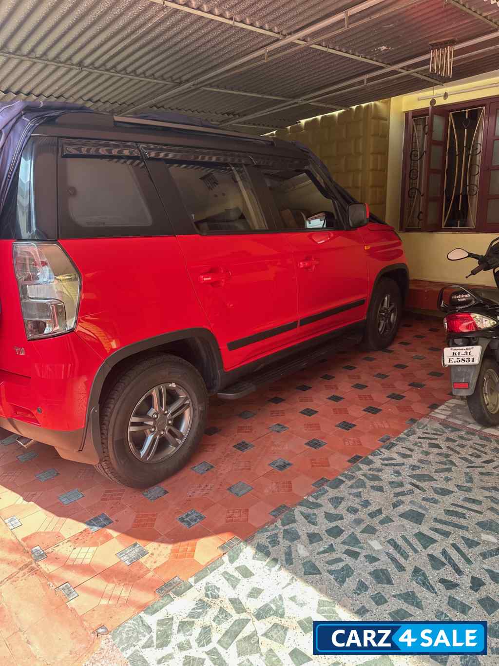 Highway Red Mahindra TUV300 T10