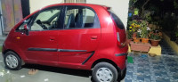 Sangria Red Tata Nano Twist XTA Automatic