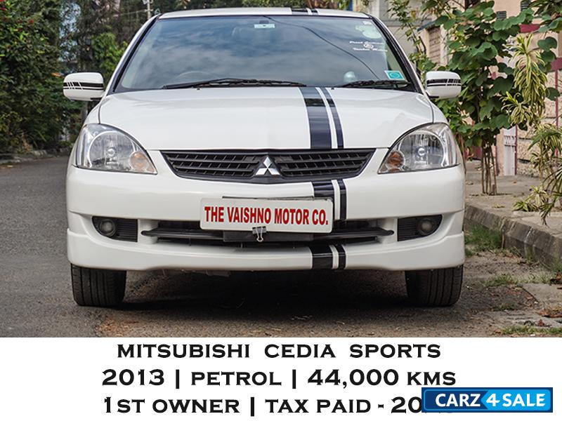 White Mitsubishi Cedia Sports