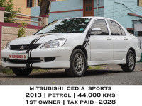 White Mitsubishi Cedia Sports