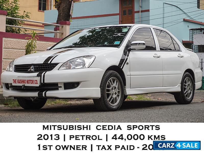 White Mitsubishi Cedia Sports
