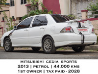 White Mitsubishi Cedia Sports