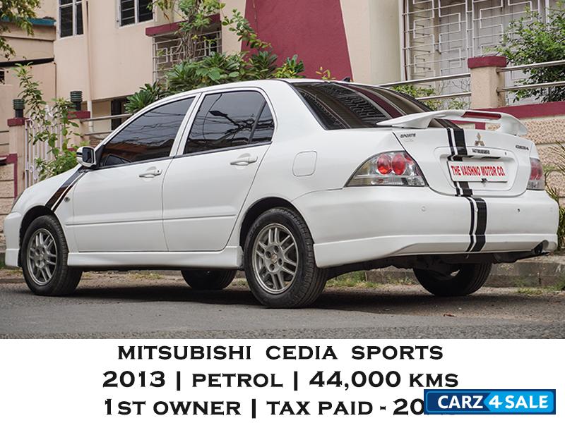 White Mitsubishi Cedia Sports