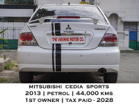 White Mitsubishi Cedia Sports