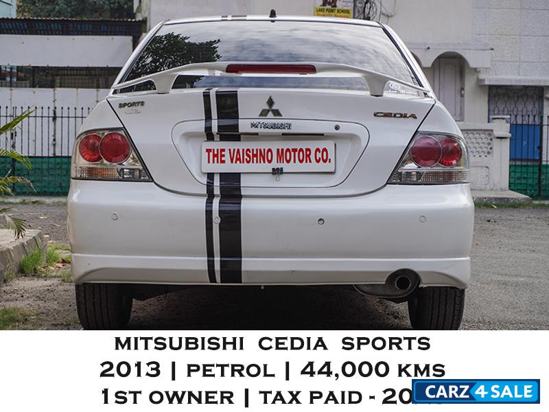 White Mitsubishi Cedia Sports
