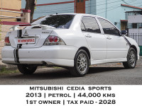 White Mitsubishi Cedia Sports