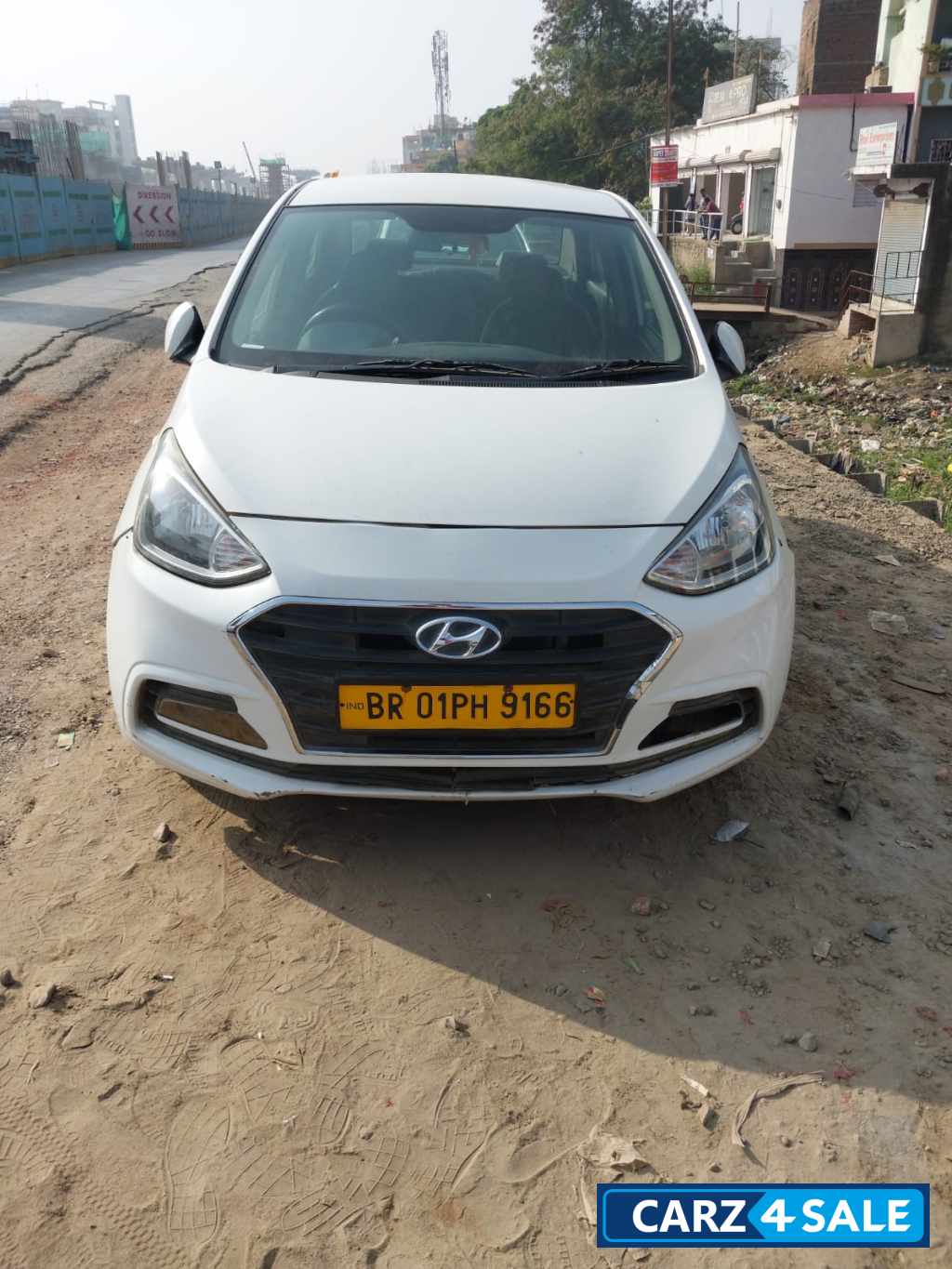 White Hyundai Xcent 1.2 C R D I E PLUS