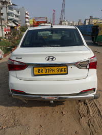 White Hyundai Xcent 1.2 C R D I E PLUS