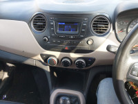 White Hyundai Xcent 1.2 C R D I E PLUS