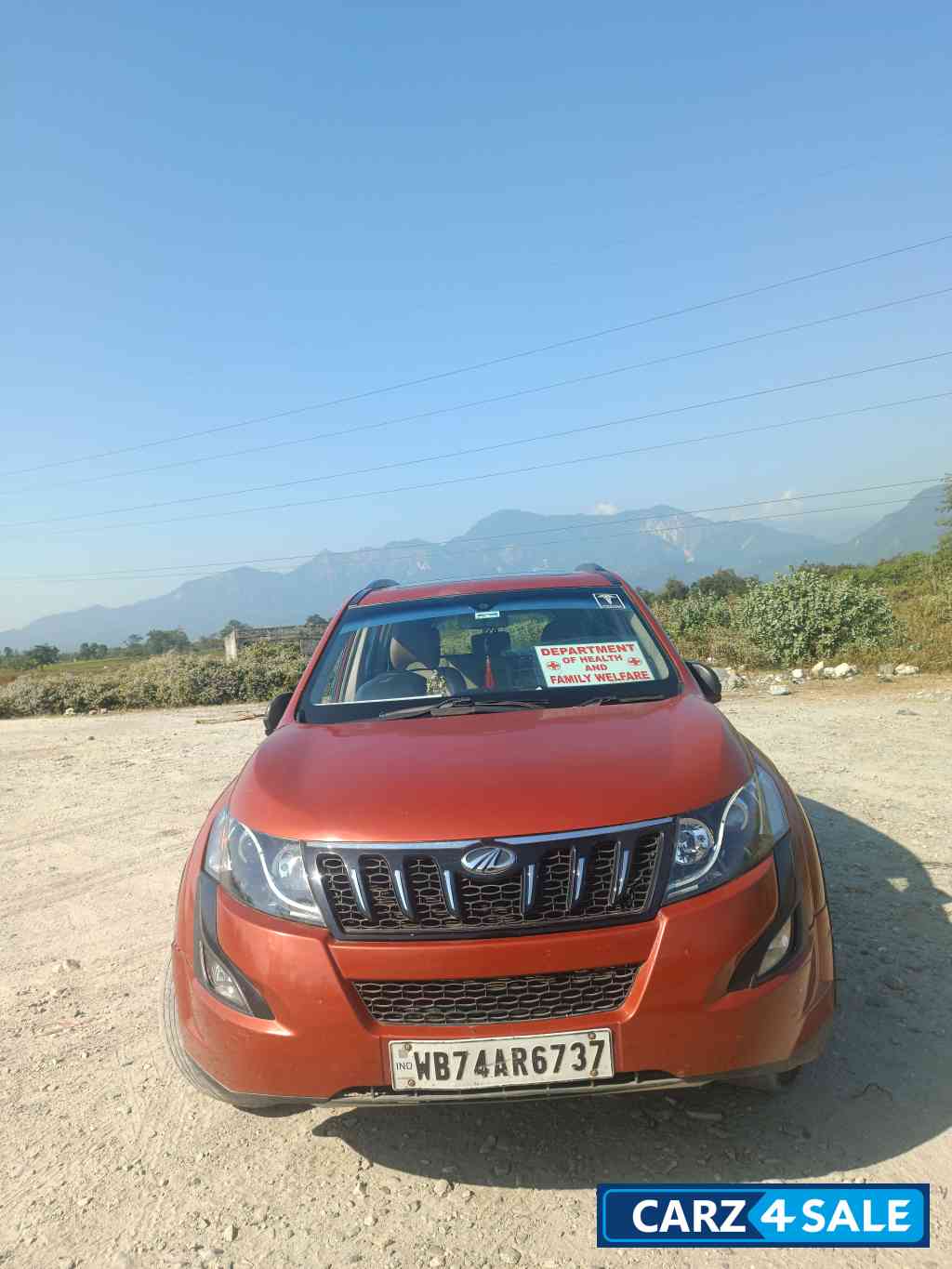 Sunset Orange Mahindra XUV 500 W10 R FWD