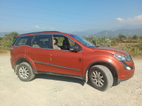 Sunset Orange Mahindra XUV 500 W10 R FWD