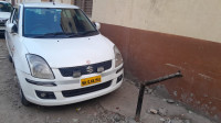 White Maruti Suzuki Swift Desire Tour