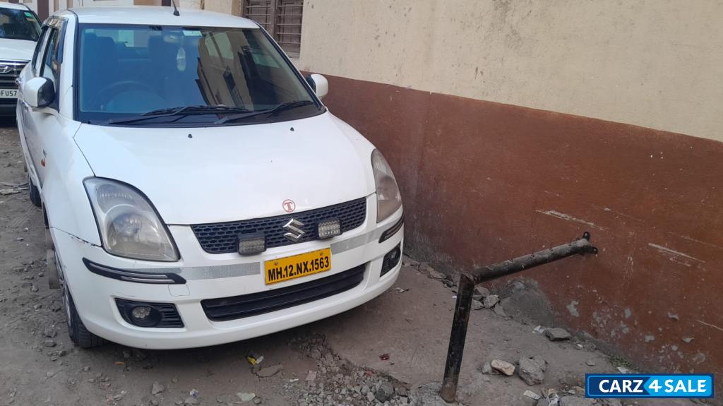 White Maruti Suzuki Swift Desire Tour